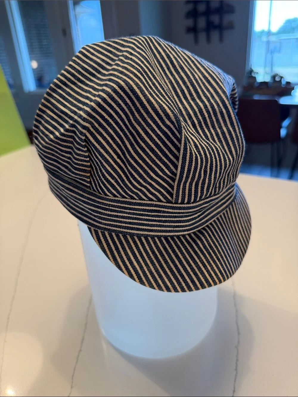 Vintage hickory stripe train engineer child’s cap, known as a railroad conductor